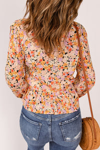 Floral Buttoned Plunge Peplum Blouse